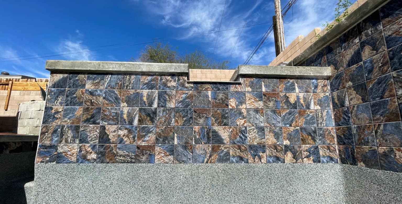 The same waterline tile, clean, after the scale was removed